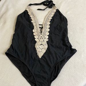 Kona Sol black one piece XL